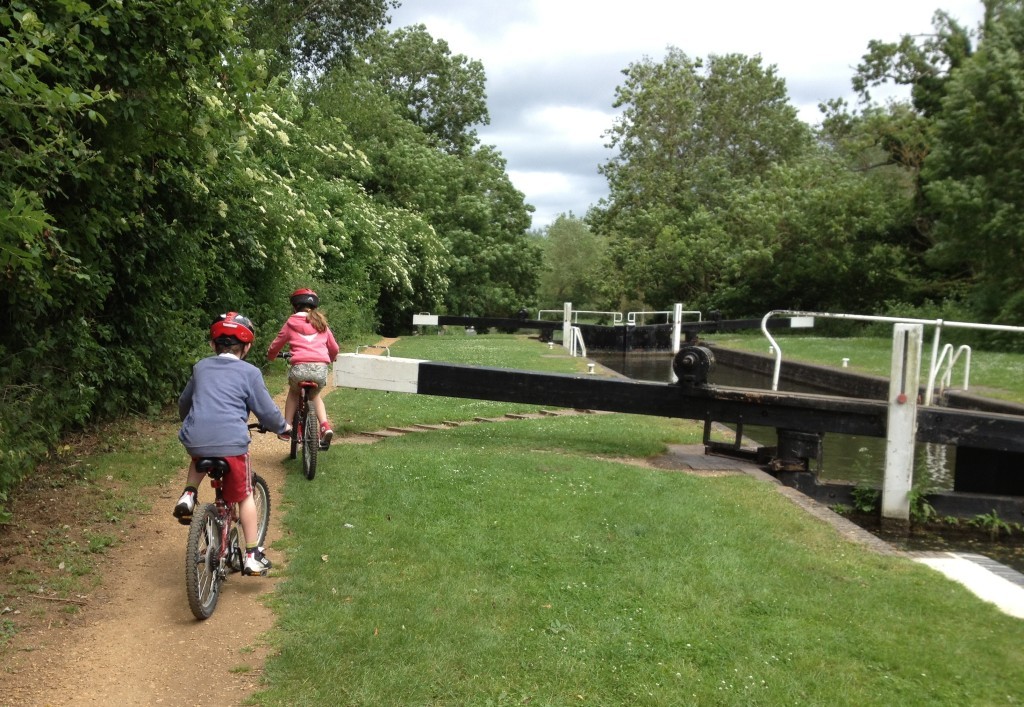 Cycling past the Kennet and Avon canal locks