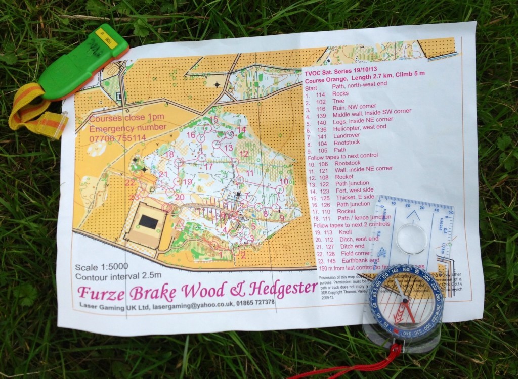 Orienteering map, compass and dibber