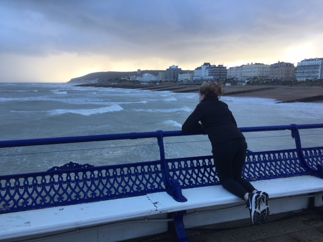 Watching the rain approach from Eastbourne pier