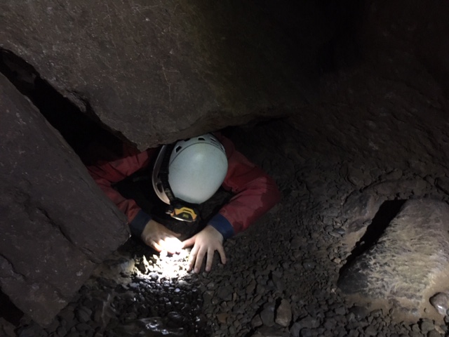 Caving inside Goatchurch Cavern, Mendips